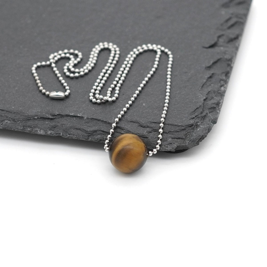 Mystisch & Elegant - Edelstahl Halskette aus mattem Tigerauge auf Kugelkette