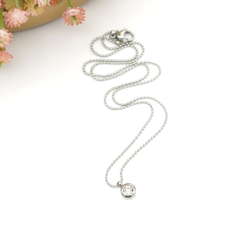Edelstahl-Halskette mit rundem Anhänger & kristallklarem Kristallstein